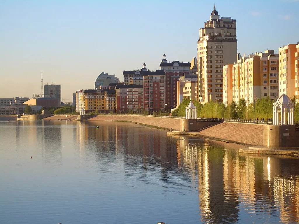 Astana's Ishim River embankment with modern towers across the water