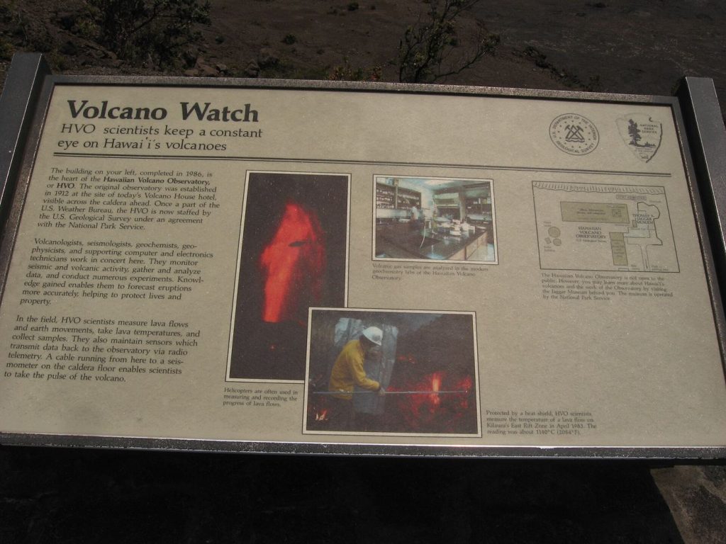 Scientist monitoring an active volcano with instruments